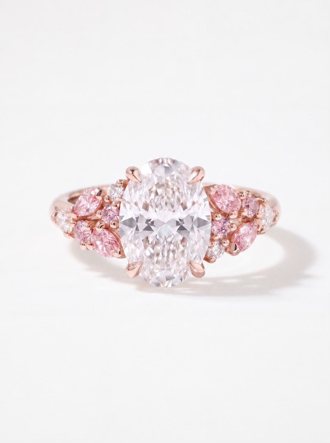 Bague diamant ovale et saphirs roses